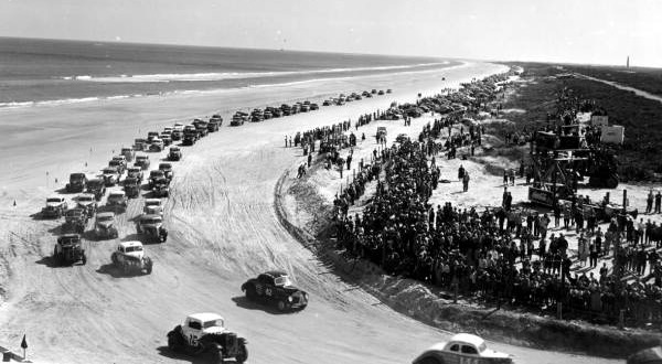 Stock cars raced on the beach at Daytona until the 2 1/2-mile speedway was constructed in the late 1 Stock cars raced on the beach at Daytona until the 2 1/2-mile speedway was constructed in the late 1