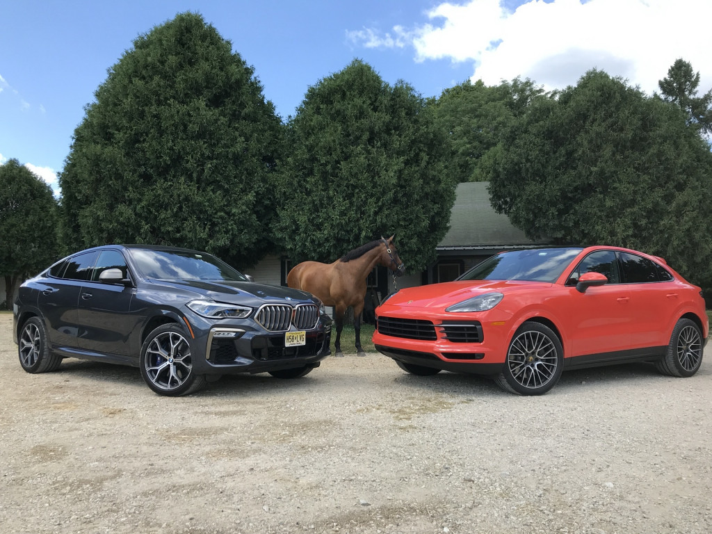 2020 BMW X6 M50i, left, and 2020 Porsche Cayenne Coupe S, right