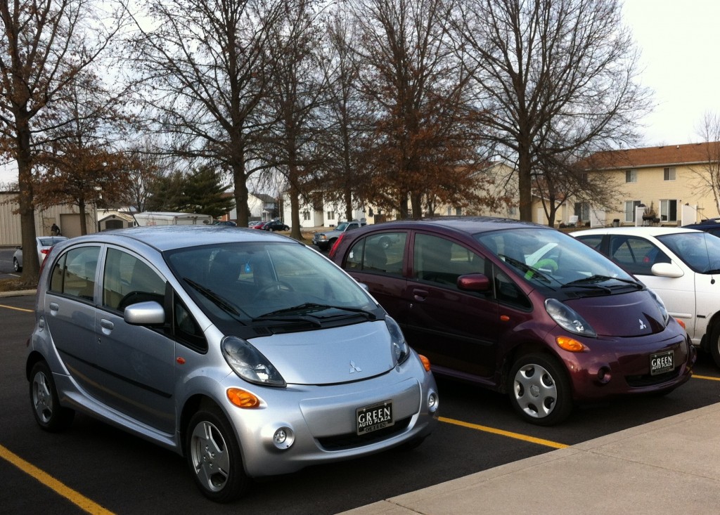Pair of Mitsubishi i-MiEV electric cars parked at work [photo: Jen Danzinger]
