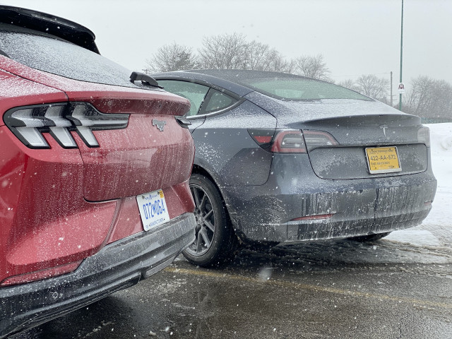 2021 Ford Mustang Mach-E, left, and 2021 Tesla Model 3, right