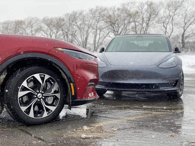 2021 Ford Mustang Mach-E, left, and 2021 Tesla Model 3, right