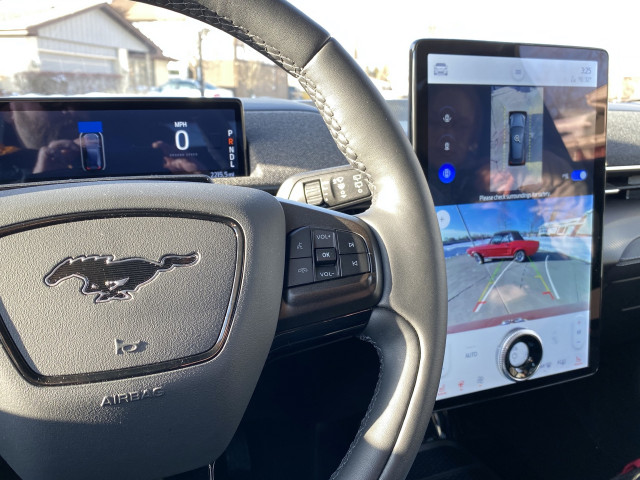 2021 Ford Mustang Mach-E and 1967 Ford Mustang coupe