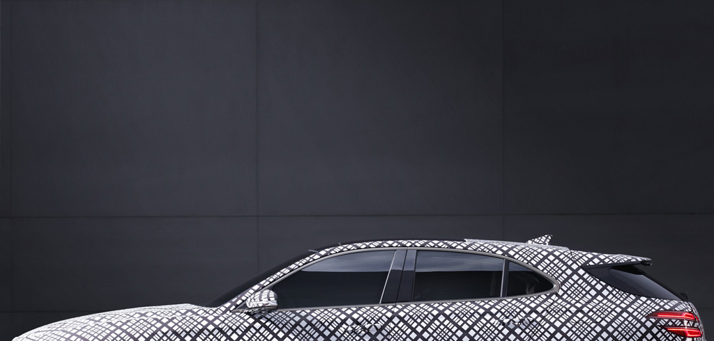 Teaser for 2022 Genesis G70 wagon
