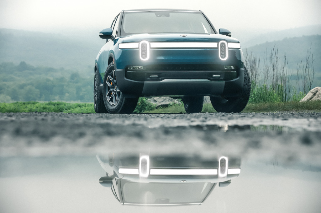 Rivian is putting charging stations at trailheads so owners can go on adventures.