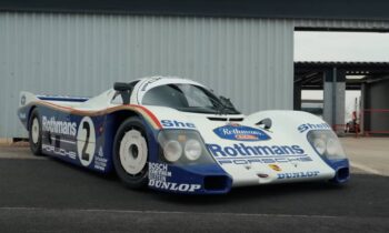 Watch Ben Collins drive a 1985 Porsche 962 Rothmans Group C racer headed to auction