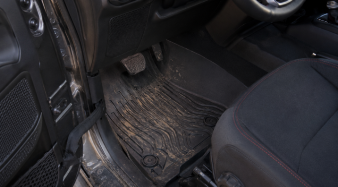 Black all-weather floor liners fitted in a 2021 Jeep Wrangler Rubicon.